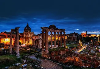 Rome's Imperial Forums lit at dusk